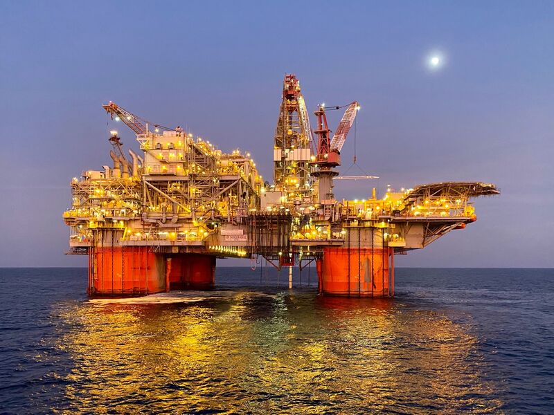 Offshore production platform at dusk