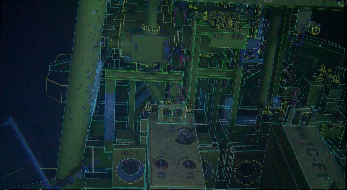 Subsea manifold video frame overlaid with its as-built CAD wireframe