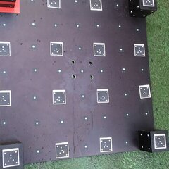 Calibration plate with coded and uncoded targets